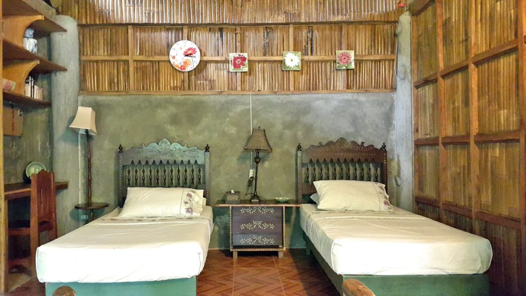 two-single-beds-in-a-room-at-camp-explore