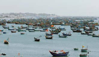 fishing-boats-afloat-the-waters-of-mui-ne